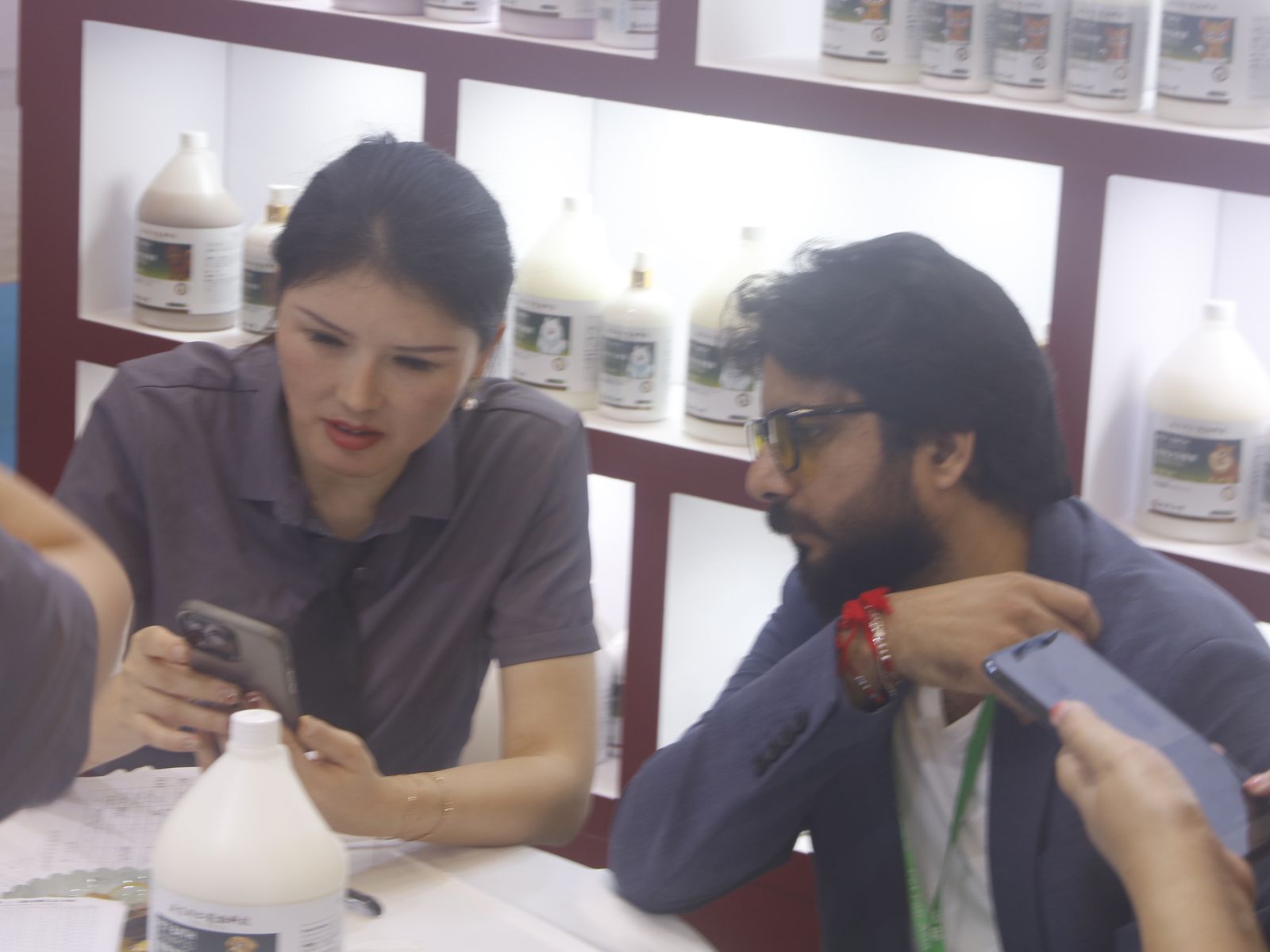 International buyers consult at the booth